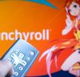 TV screen with orange background Crunchyroll streaming anime character with hand holding remote to play 