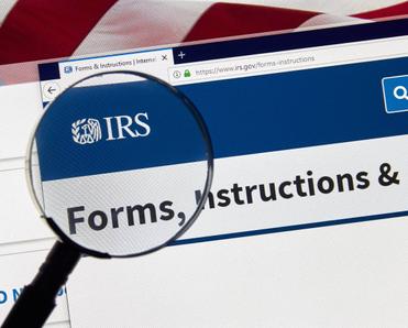 An Internal Revenue Service webpage with a magnifying glass on the word forms.