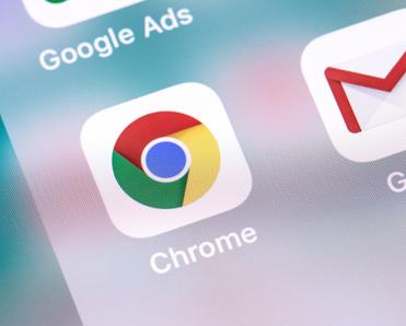 A close-up of the Google Chrome web browser app icon on a cell phone screen.