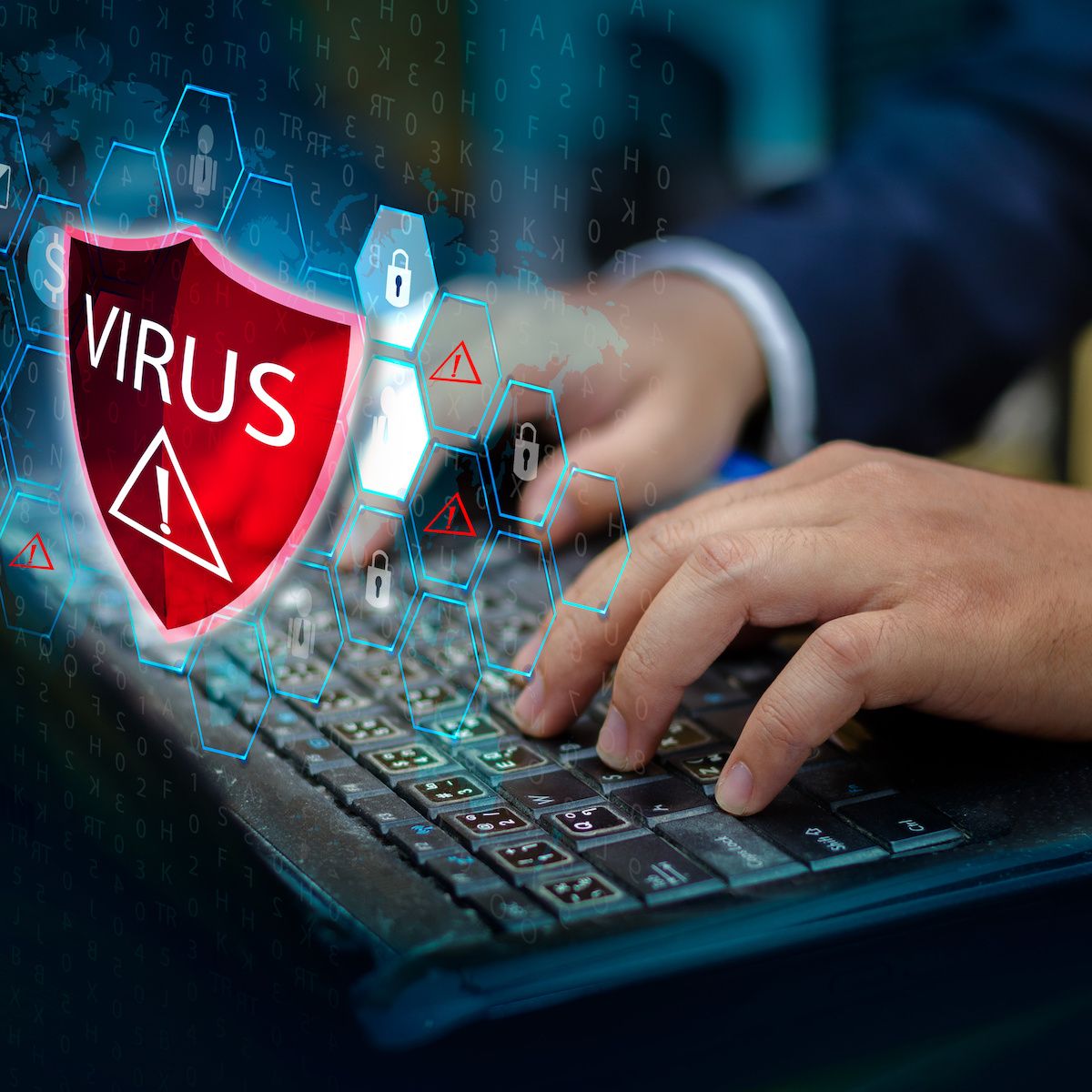 A man&#x27;s hands rest on a laptop keyboard with a red shield and the word &quot;Virus&quot; floating above it to signify the WebHelper virus.