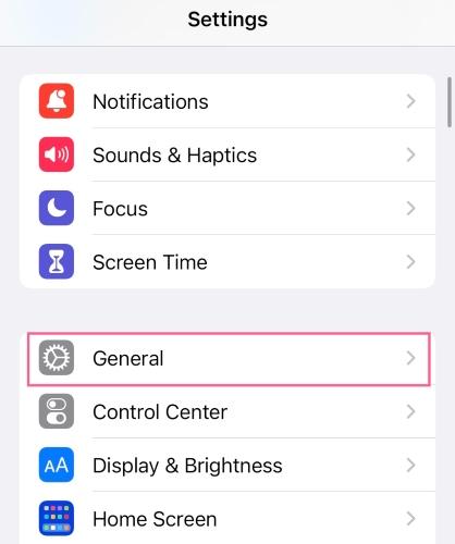 The Settings screen on an iPhone with an outline around the General button.