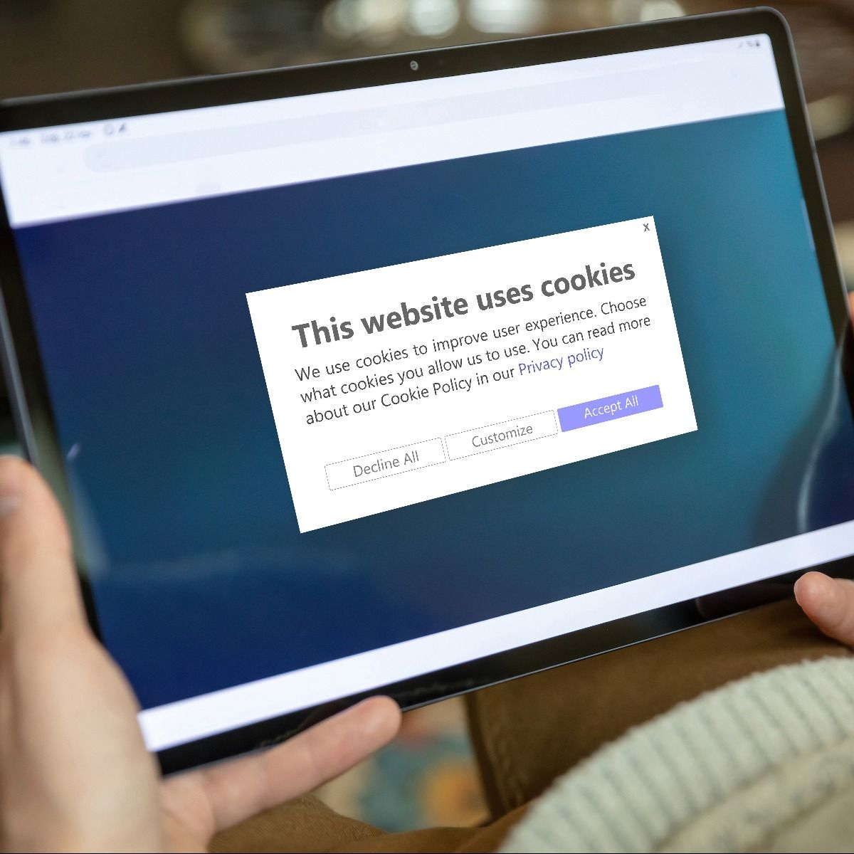 tablet with cookie popup