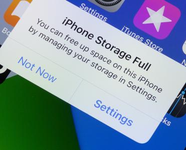 iPhone screen with a push notification about full storage