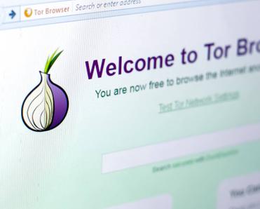 Tor browser on a PC display with a logo in the form of an onion.