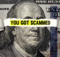 A U.S. $100 dollar bill shows Ben Franklin&#x27;s face torn open to show the words, &quot;You got scammed&quot; as a reference to how online shopping fraud increases over the holidays.