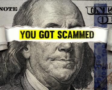 A U.S. $100 dollar bill shows Ben Franklin&#x27;s face torn open to show the words, &quot;You got scammed&quot; as a reference to how online shopping fraud increases over the holidays.