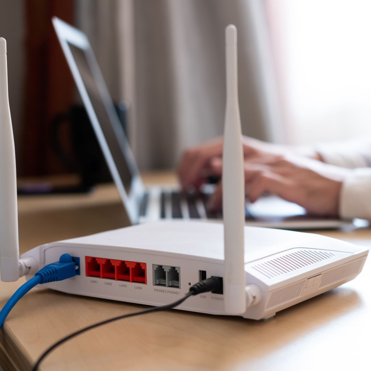 Router in front of a laptop