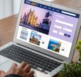 A person searches an online travel agency website for flights and hotels, both of which can be found at cheaper prices when using a VPN.